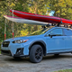 Crosstrek with kayaks - front view.